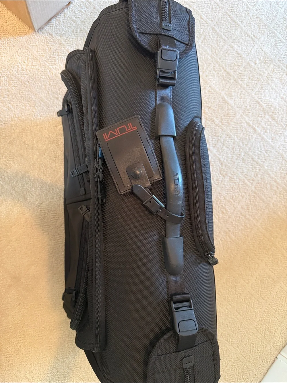 Tumi Black Fold-Open Garment Bag with Multiple Zip Pockets